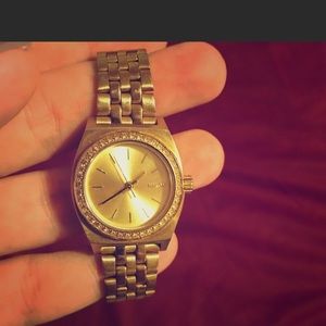 Nixon golden watch
